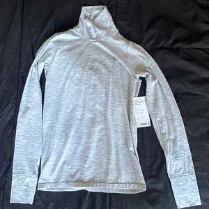 Light grey athleta turtleneck in size medium